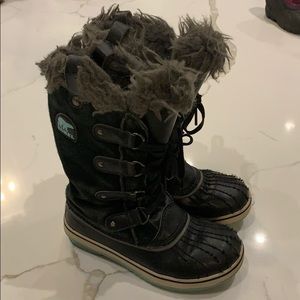 Sorel Joan of Arctic boots.